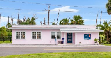 Inviting front entry with screen door; lots of parking -- including boats!