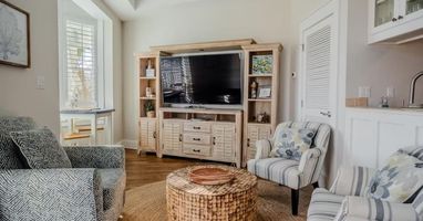 Conversational seating adjacent to private balcony