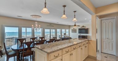 View of Ocean from Kitchen through Floor-to-Ceiling Windows
