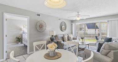 Spacious Living Room and Dining Area Offering a View of the Neighborhood