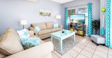 Living Room with walk out patio - 
Sandpiper Cove Resort 9106 Holiday Isle Destin Florida Vacation Rentals
