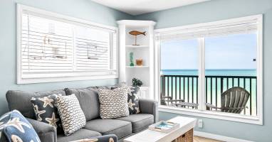 Looking directly at the beach from the living room of Beach House Resort number 9 