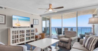 Sink into plush sofas and let the endless turquoise horizon melt your stress away through panoramic glass doors opening to your private oceanfront balcony.