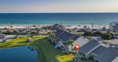 Lakefront villa just steps from the white sand beach! Enjoy the best of both worlds—tranquil water views and quick beach access right across the street.