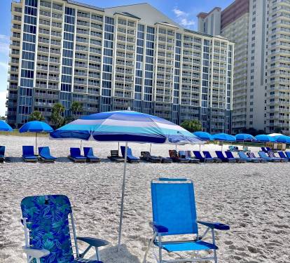 Beach chairs and umbrella are provided in the unit.