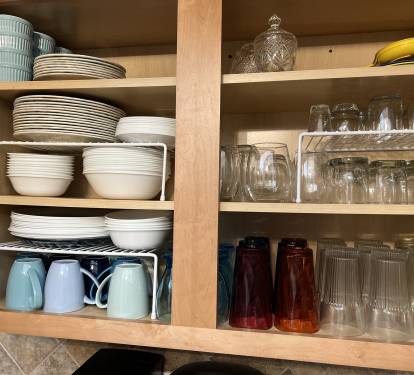 2023 Stocked Cupboard - Wine Glasses and Pint glasses in Dining Room Hutch