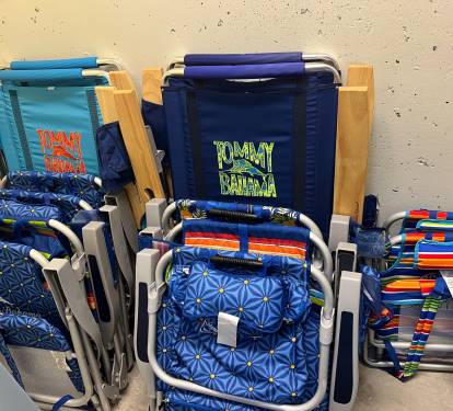 No need to pack the car or buy beach chairs here, the beach storage closet includes Tommy Bahama chairs and umbrellas for your use. (Items may vary)