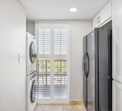 Washer/Dryer, elegant plantation shutters