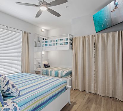 King bunk suite with wall-mounted Smart TV