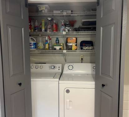 Laundry room in condo. 