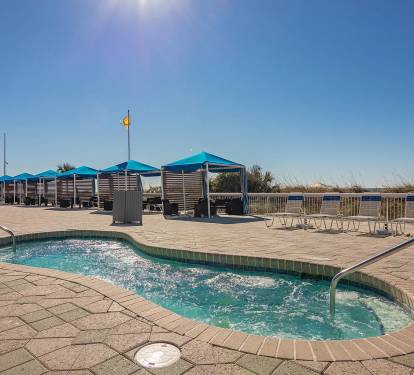 1 of 11 hot tubs resort wide, cabanas available to rent, some of the free lounge seating