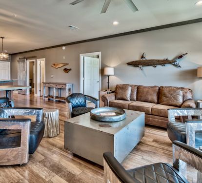 Industrial Chic design, Custom Rebar Light Fixtures and Leather Airplane Chairs