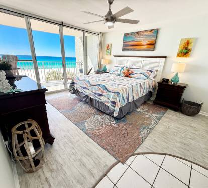 Super comfortable Cal King mattress with beautiful emerald green Gulf front views.