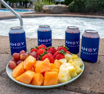 Hot tub, cold drinks, and a fruit plate — Ahoy, indeed.