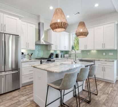 Our kitchen is a chef's delight, equipped with a six burner gas stove and all the tools and gadgets needed to create delicious meals.