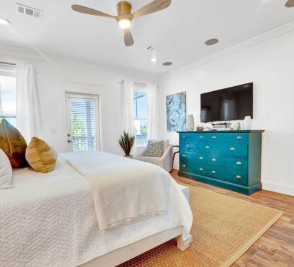 Queen bedroom with ensuite bathroom on the main level