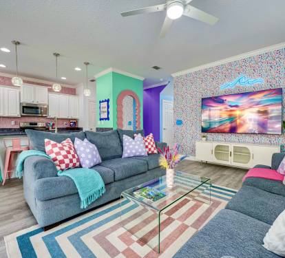 large open living room for family gatherings. Couch on right is a queen sleeper sofa.