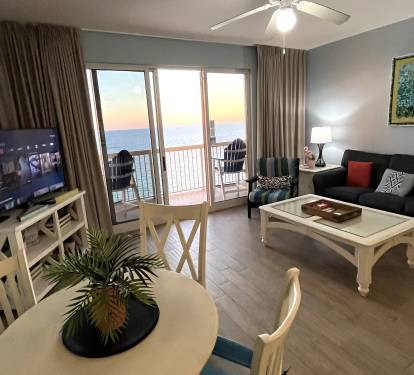 right, open-concept living space that seamlessly frames the beautiful Gulf views.