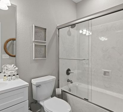 Bathroom #3: Private attached bathroom with shower/tub combo