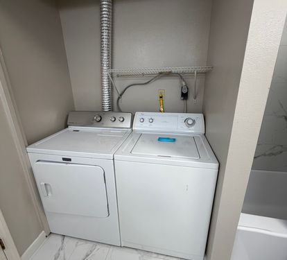 Laundry Area In Bathroom