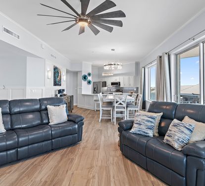 Living room with plush seating and Smart TV