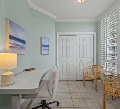Desk area between laundry closet and kitchen