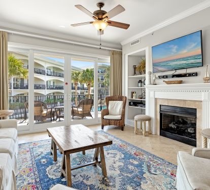 bright, airy living space with balcony access