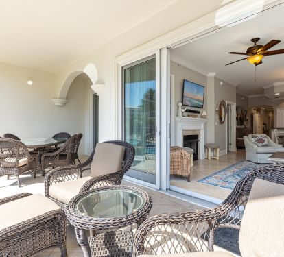 outdoor lounge space plus large outdoor dining table