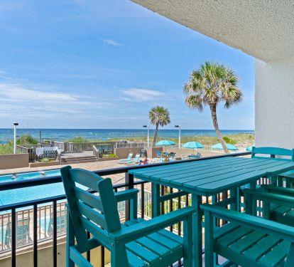 Have a coffee on the balcony while listening to the waves