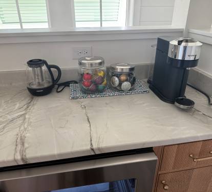 Main house upstairs beverage station with mini-fridge and Nespresso coffee/espresso machine