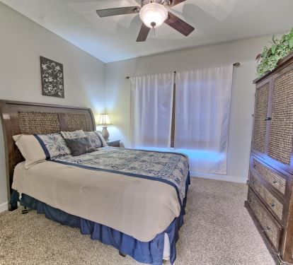 Guest room with plenty of storage and a tv inside. 