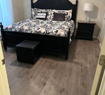 Master bedroom with king bed and brand new lvt flooring!