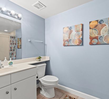 Bunk bathroom with walk in shower. Low clearance for handicapped access. 