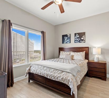 Guest bedroom with sturdy queen bed. Large dresser and tv (not pictured).