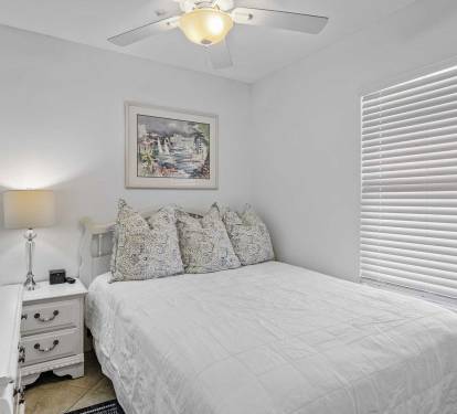 Queen bed in guest room