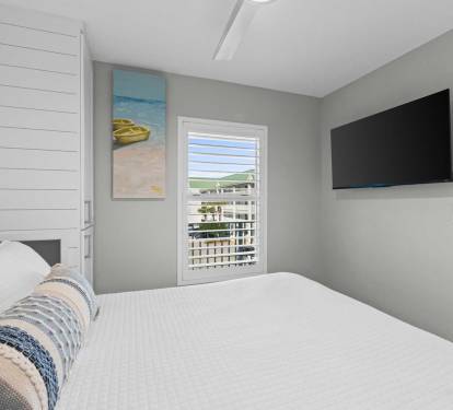 Beach vibes on demand-open the sliders and let the Gulf breeze mingle with the comfy, coastal-chic living space."
