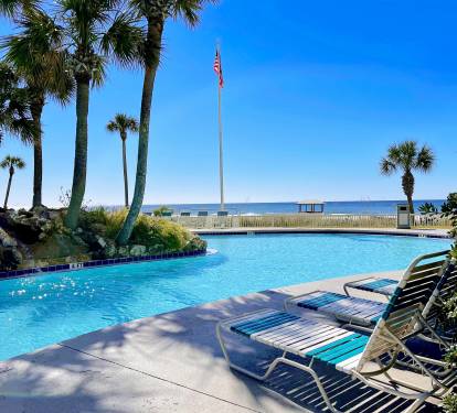 Lagoon pool on the beach with plenty of adjustable seating