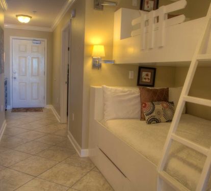 Hall bunks with full size bottom bunk and a TV