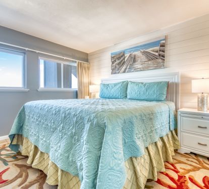 Rest easy in this spacious and cozy bedroom.