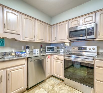Cook up your favorite meals in this cozy kitchen.
