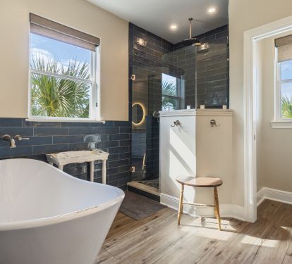 Primary ensuite with walk-in shower and soaking tub