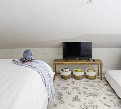 Bonus bedroom in loft has queen bed and trundle bed (sleeps 3)