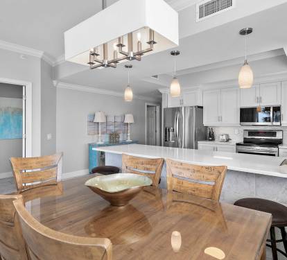 Family-style dining made easy with large table and breakfast bar