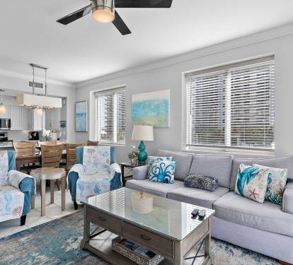 Coastal-inspired living room with beach views and comfy seating