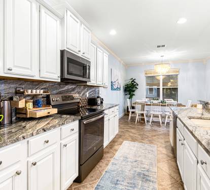 A full-size, fully equipped kitchen. Home-cooked breakfasts, beach lunches, real dinners. Cook when you want, order out when you don't.