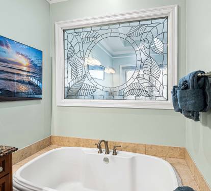 Gigantic tub, big enough for two average sized adults comfortably. 