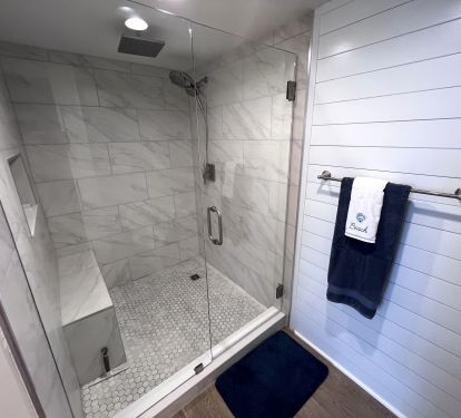 Newly renovated Master Bath with large walk-in shower with multiple shower heads