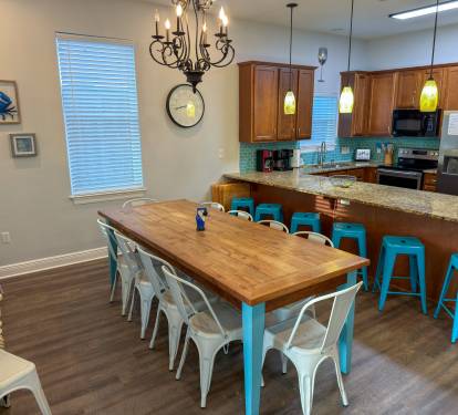Casual, comfortable, and full of beach-house charm, the dining area is perfect for pancake breakfasts before heading to the shore.  