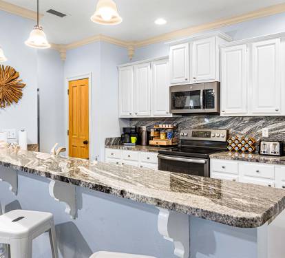 Pull up a barstool for your morning coffee or a snack between beach sessions.