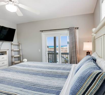 King Bedroom on Main level-Gulf Views. Great views of gulf and access to deck. This bedroom now has a king bed - stay tuned for updated photos!